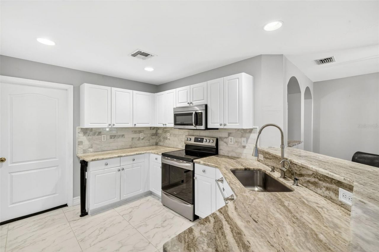 421 Broadmoor Street, Lehigh Acres, FL 33974 Photo