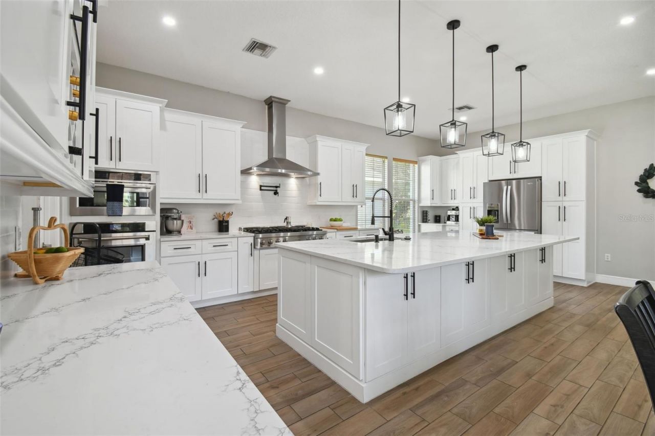 7009 Five Oaks Drive, Harmony, FL 34773 Photo