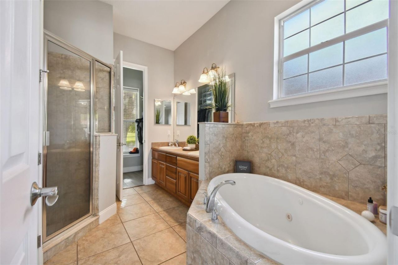 7009 Five Oaks Drive, Harmony, FL 34773 Photo