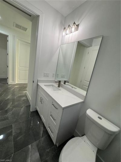 109/111 Harry Ave S, Lehigh Acres, FL 33973 Photo