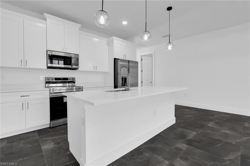 109/111 Harry Ave S, Lehigh Acres, FL 33973 Photo