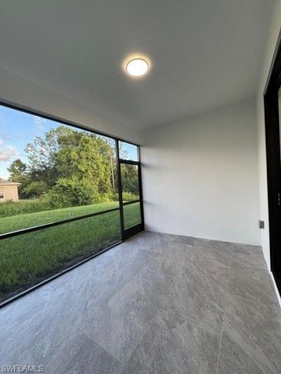 109/111 Harry Ave S, Lehigh Acres, FL 33973 Photo