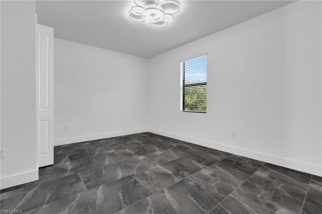 109/111 Harry Ave S, Lehigh Acres, FL 33973 Photo