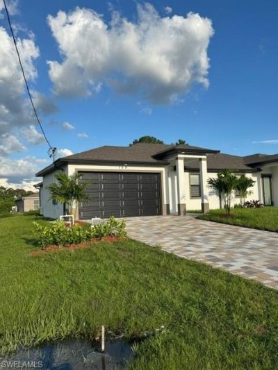109/111 Harry Ave S, Lehigh Acres, FL 33973 Photo