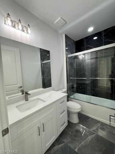 109/111 Harry Ave S, Lehigh Acres, FL 33973 Photo