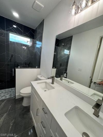 109/111 Harry Ave S, Lehigh Acres, FL 33973 Photo