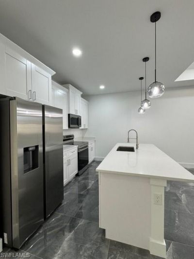 109/111 Harry Ave S, Lehigh Acres, FL 33973 Photo