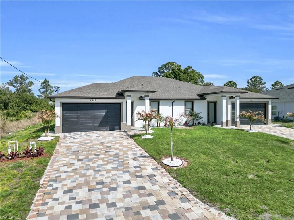 109/111 Harry Ave S, Lehigh Acres, FL 33973 Photo