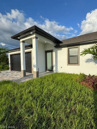 109/111 Harry Ave S, Lehigh Acres, FL 33973 Photo