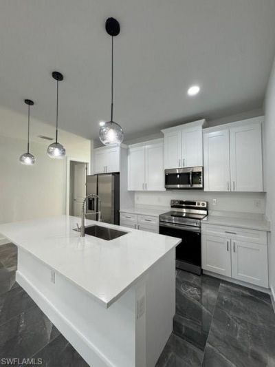 109/111 Harry Ave S, Lehigh Acres, FL 33973 Photo