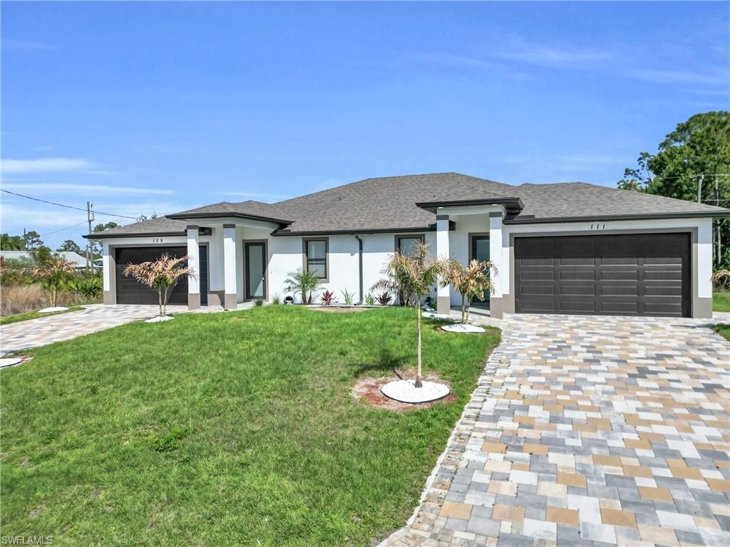 109/111 Harry Ave S, Lehigh Acres, FL 33973 Photo