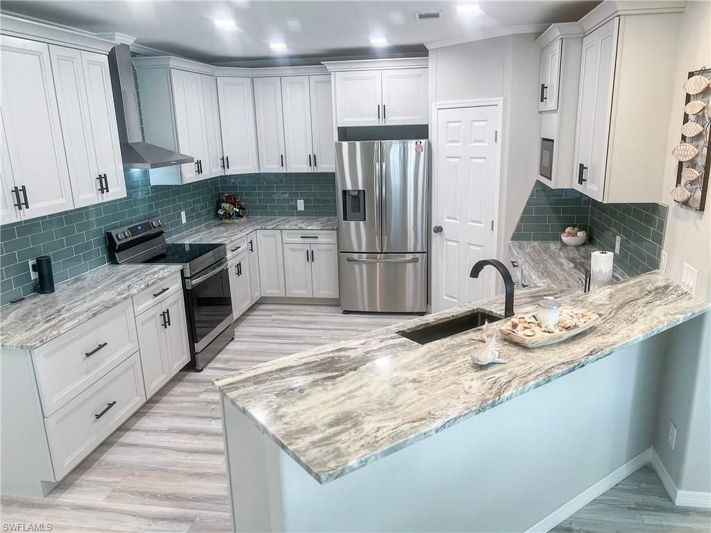 17561 Canal Cove Ct, Fort Myers Beach, FL 33931 Photo