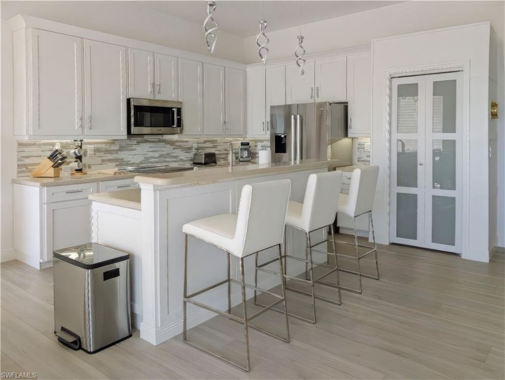 5758 Lago Villaggio Way, Naples, FL 34104 Photo