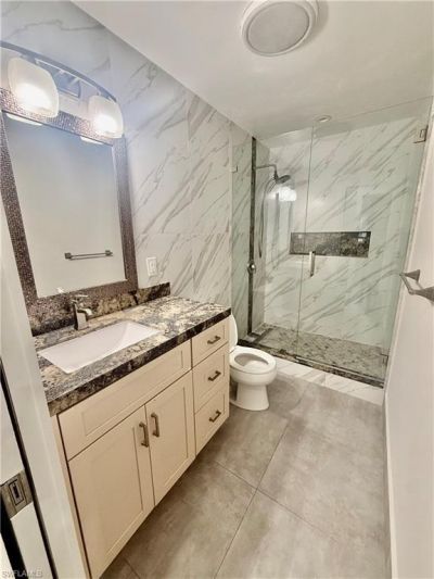 733 Pine Cone Ln, Naples, FL 34104 Photo