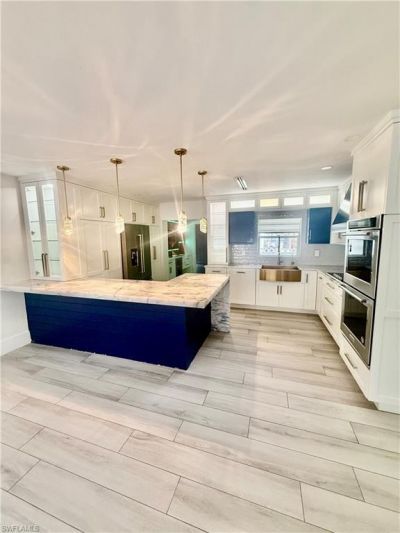 733 Pine Cone Ln, Naples, FL 34104 Photo