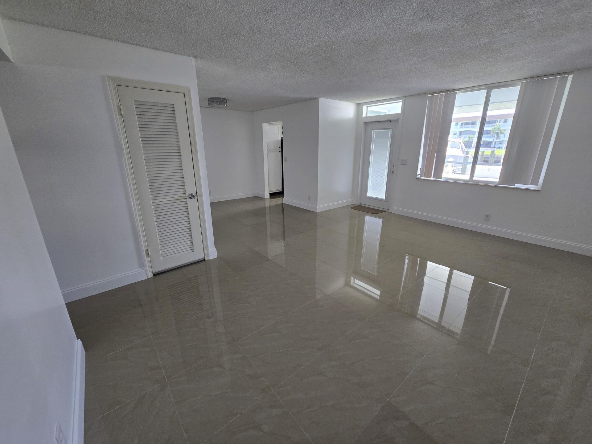 104 Paradise Harbour Boulevard, Unit 114, North Palm Beach, FL 33408 Photo