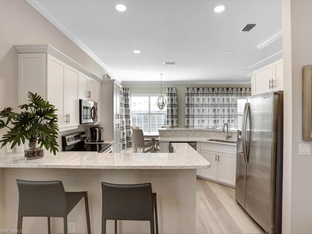1051 Egrets Walk Cir, Unit 7-201, Naples, FL 34108 Photo
