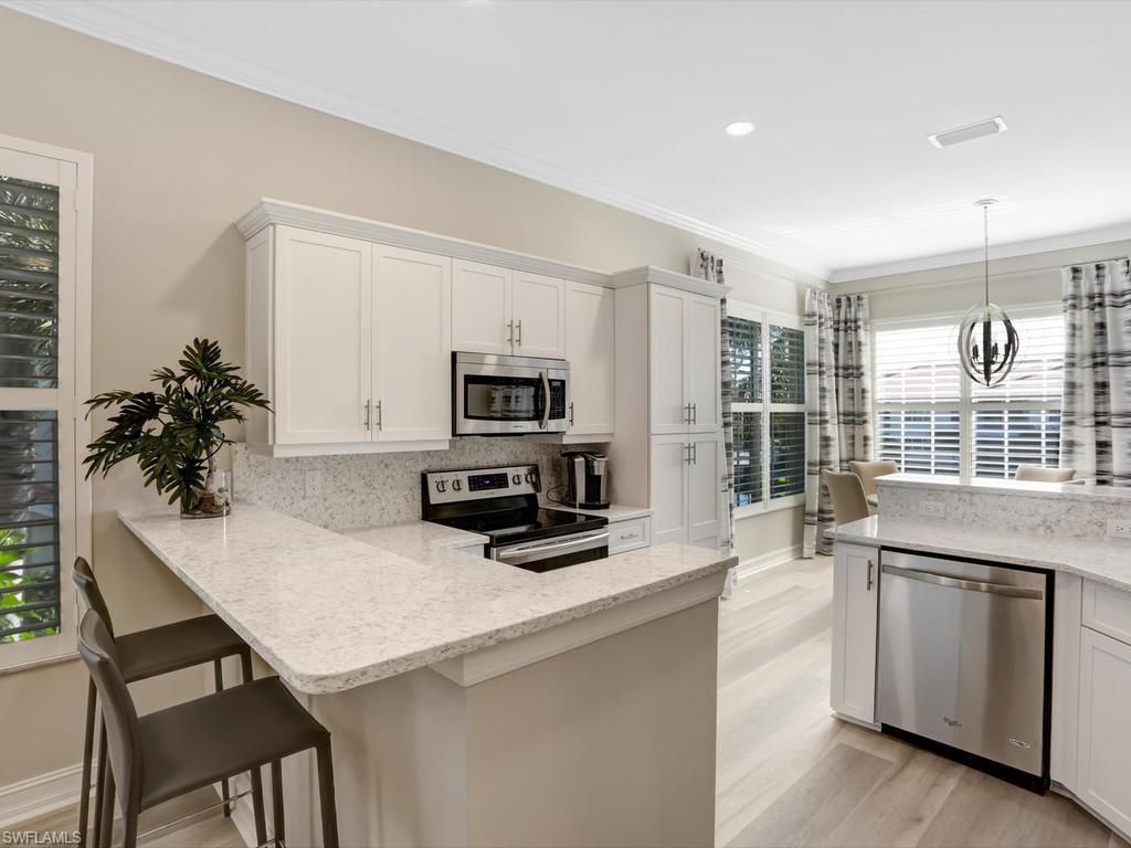 1051 Egrets Walk Cir, Unit 7-201, Naples, FL 34108 Photo