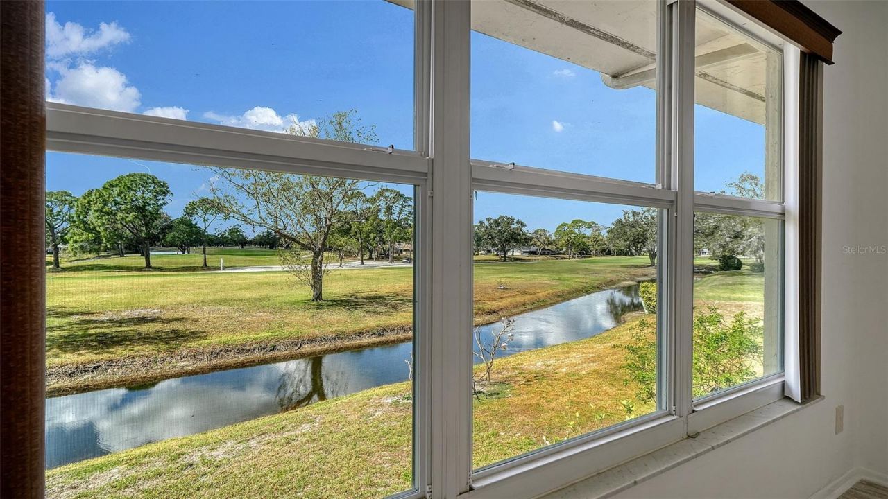 7880 Palm Aire Lane, Unit 203, Sarasota, FL 34243 Photo