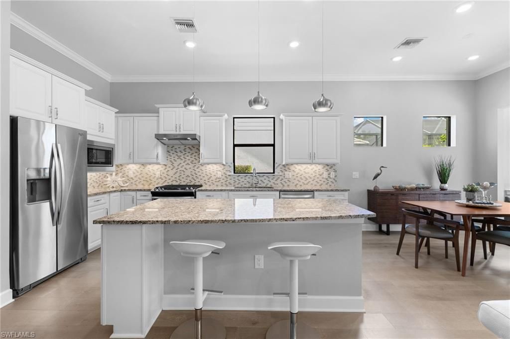 9410 Whooping Crane Way, Naples, FL 34120 Photo