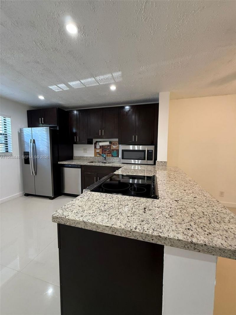 6095 N Sabal Palm Blvd, Unit 103, Tamarac, FL 33319 Photo