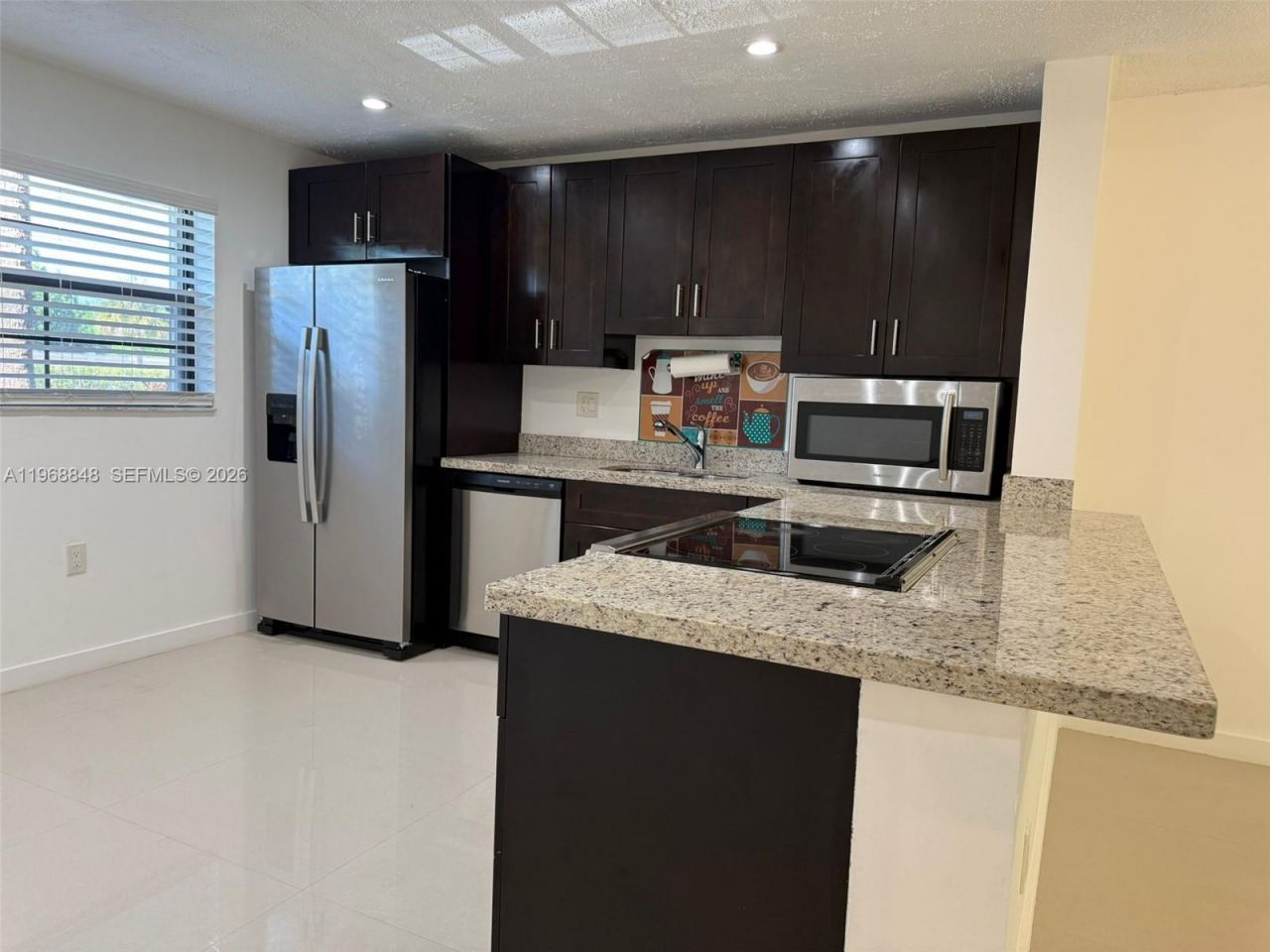 6095 N Sabal Palm Blvd, Unit 103, Tamarac, FL 33319 Photo