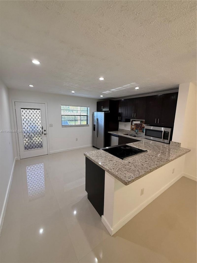 6095 N Sabal Palm Blvd, Unit 103, Tamarac, FL 33319 Photo