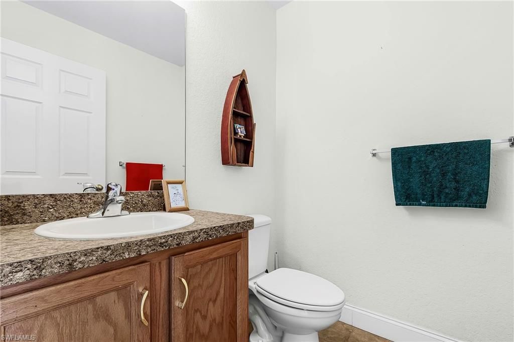 2420 Poinciana Ave , Saint James City, FL 33956 Photo