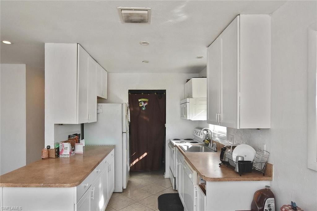 3204 41st St Sw, Lehigh Acres, FL 33976 Photo