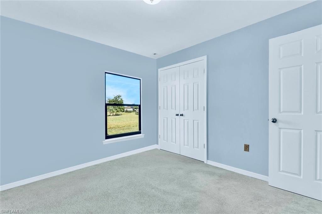 278 Shadow Lakes Dr , Lehigh Acres, FL 33974 Photo