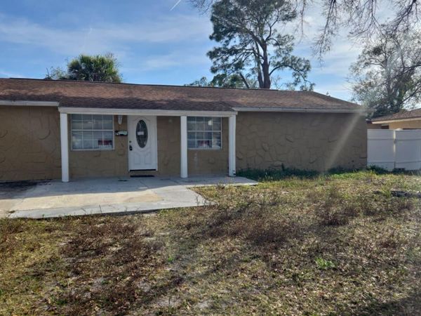 7914 WOODGROVE CIRCLE, TAMPA, FL 33615