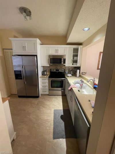 1096 Woodshire Ln, Unit C106, Naples, FL 34105 Photo