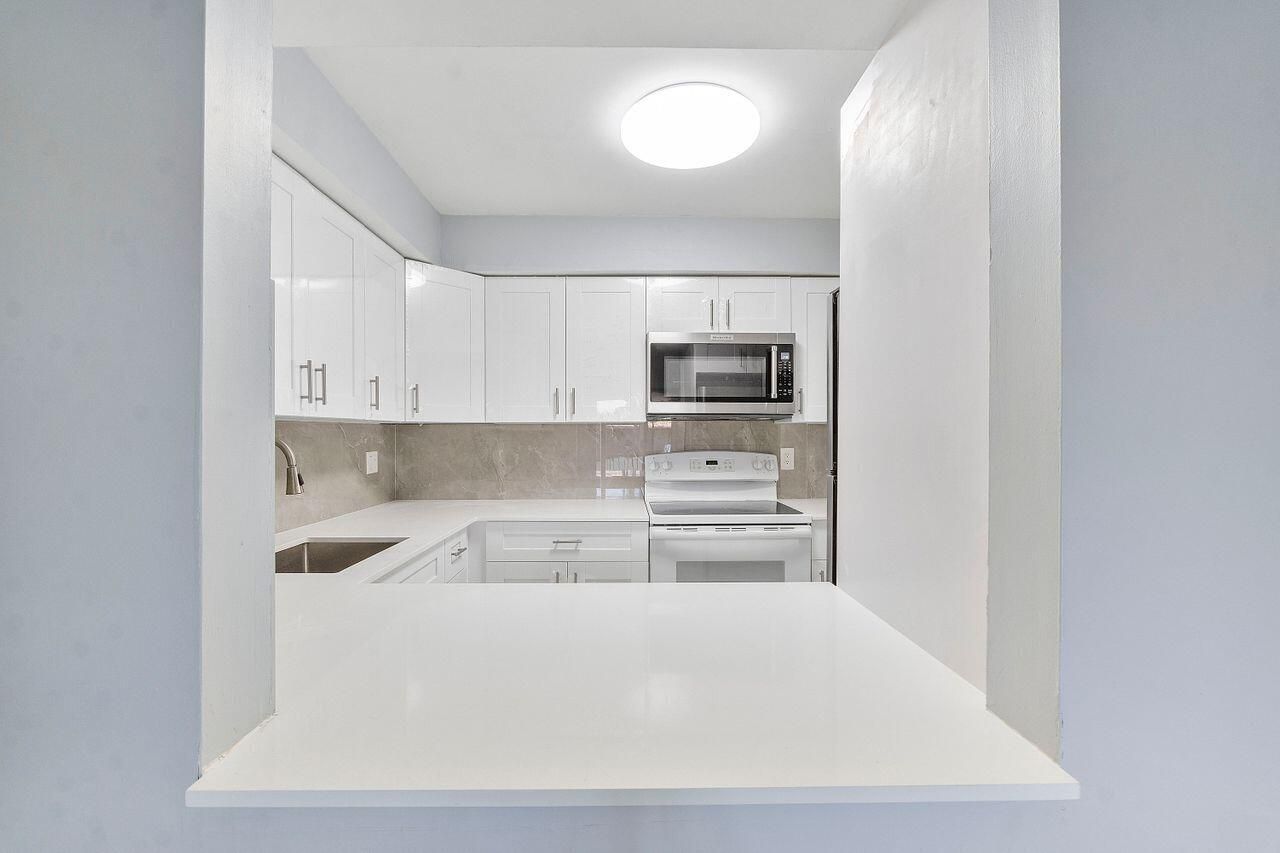 9960 Pineapple Tree Drive, Unit 107, Boynton Beach, FL 33436 Photo