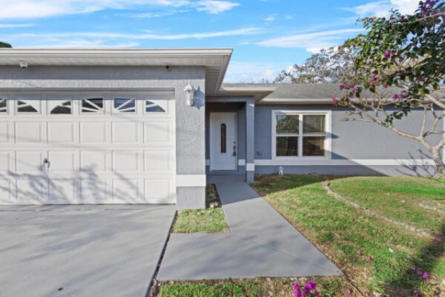 457 SW David Terrace, Port Saint Lucie, FL 34953 Photo