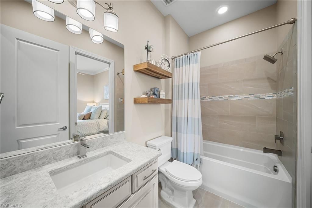 9672 Montelanico Loop, Unit 203, Naples, FL 34119 Photo