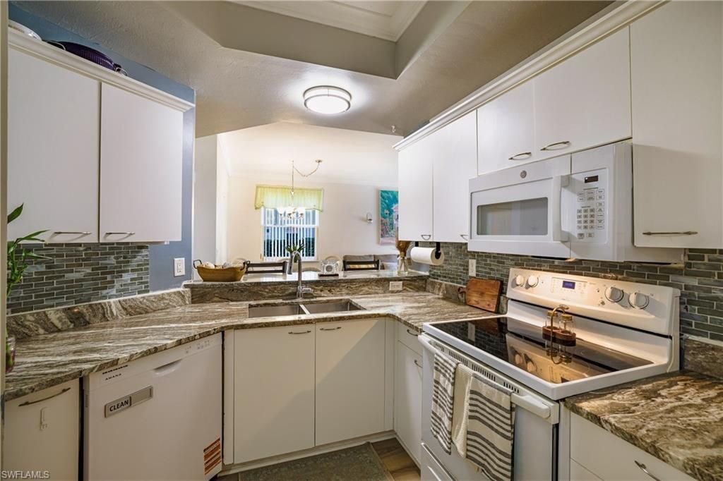 305 Robin Hood Cir, Unit 101, Naples, FL 34104 Photo