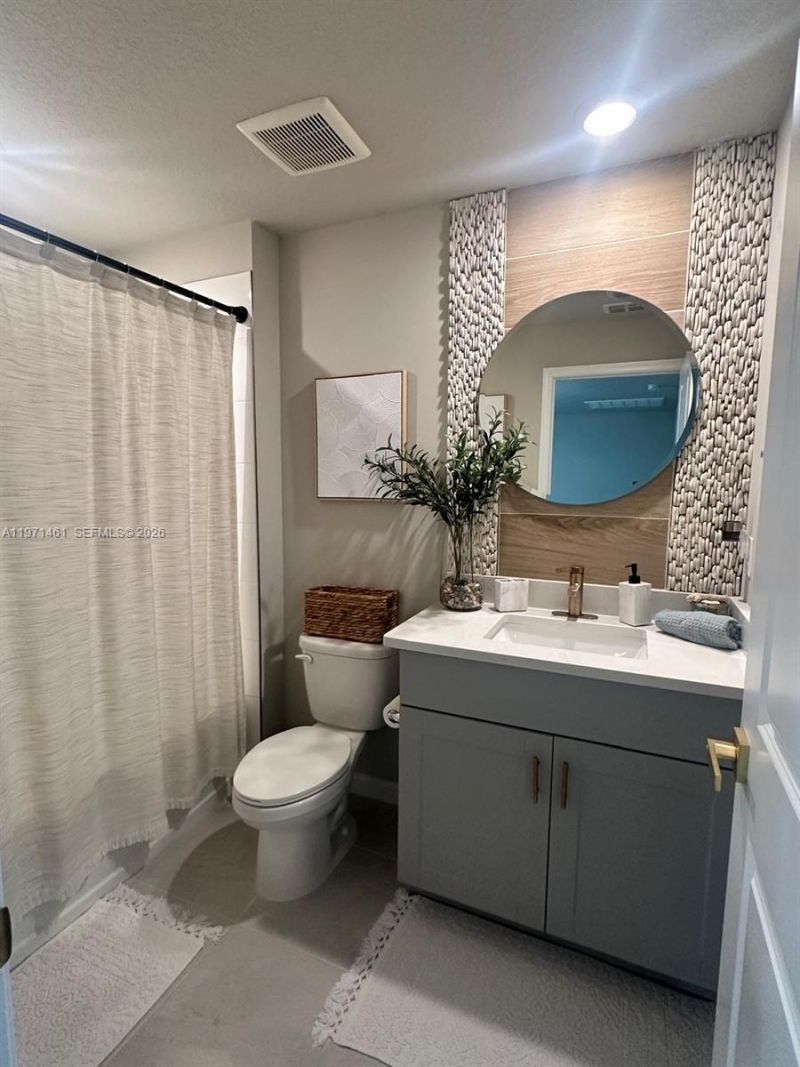 5689 Mentmore Dr , Mangonia Park, FL 33407 Photo