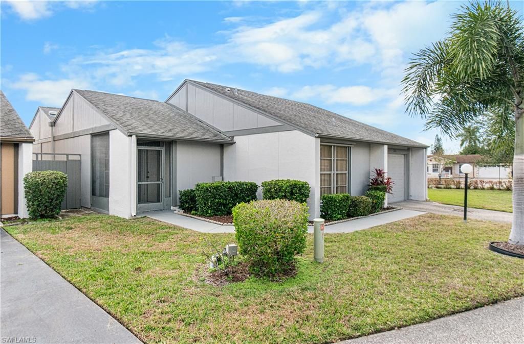 9777 Oakcrest Ct, Lehigh Acres, FL 33936 Photo