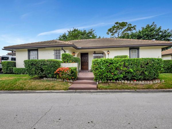 428 Pine Villa Drive, Atlantis, FL 33462