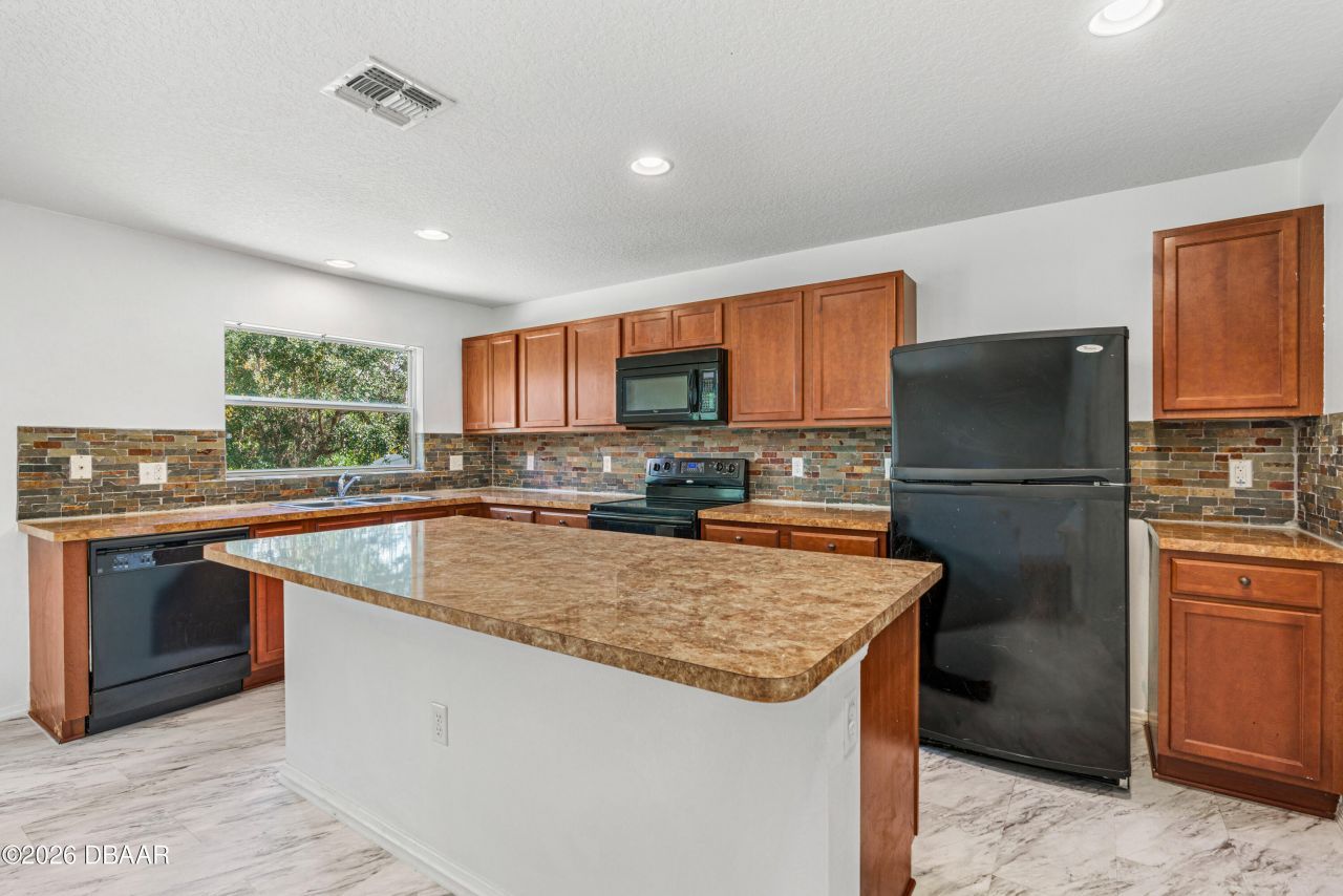 313 Bayberry Lakes Boulevard, Daytona Beach, FL 32124 Photo
