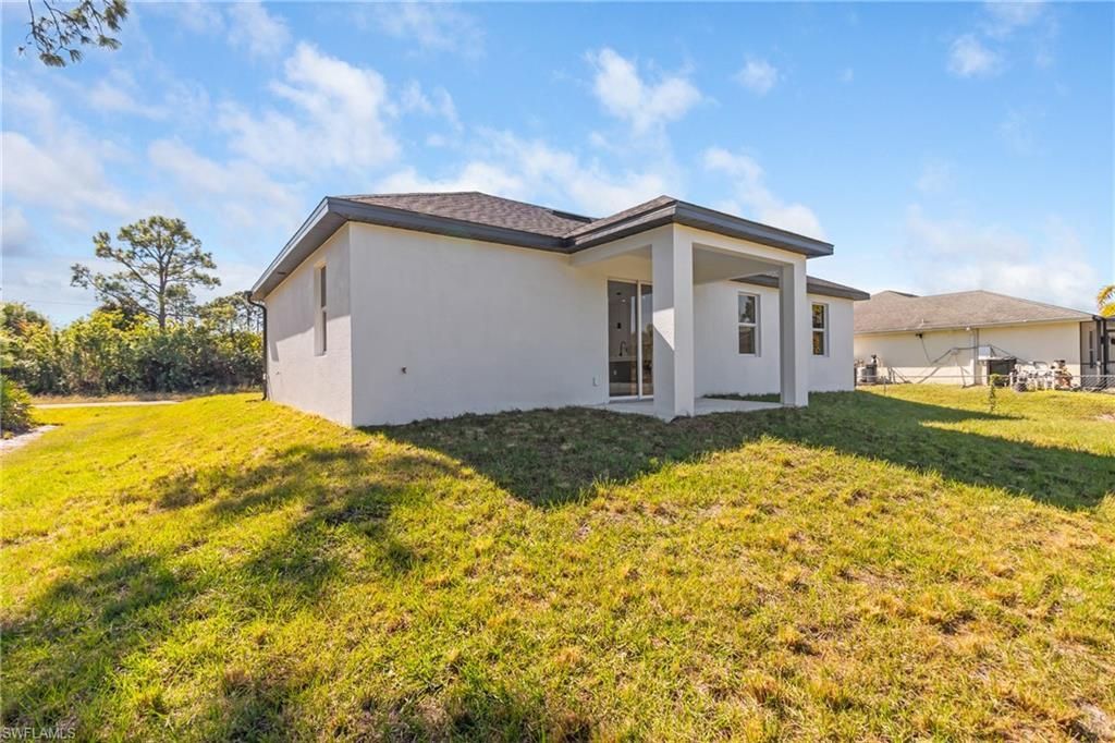 1109 Cumming St E, Lehigh Acres, FL 33974 Photo