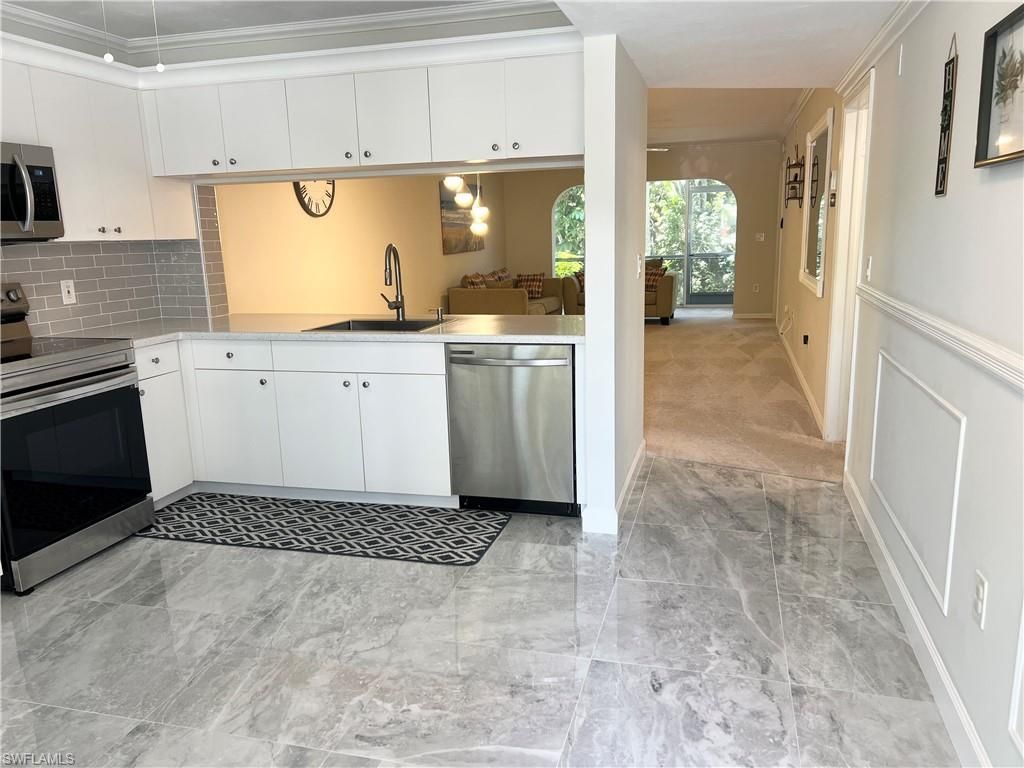 3011 Sandpiper Bay Cir, Unit C102, Naples, FL 34112 Photo