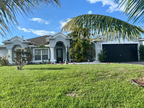 981 SW Mccomkle Avenue, Port St. Lucie, FL 34953