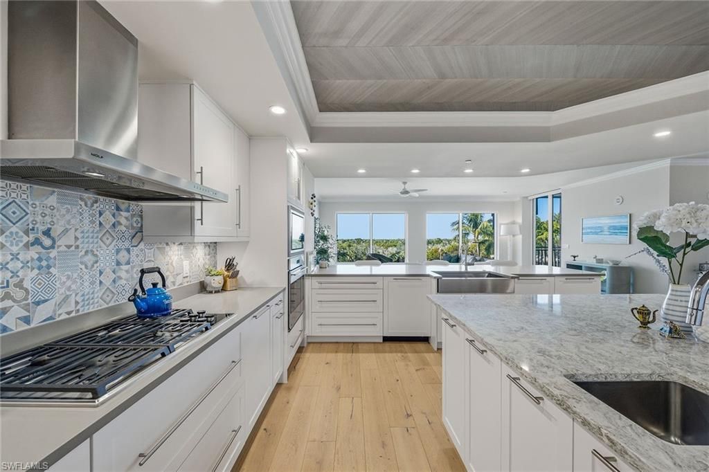 13665 Vanderbilt Dr, Unit 404, Naples, FL 34110 Photo