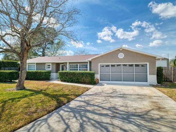 9714 POPLARWOOD COURT, ORLANDO, FL 32825