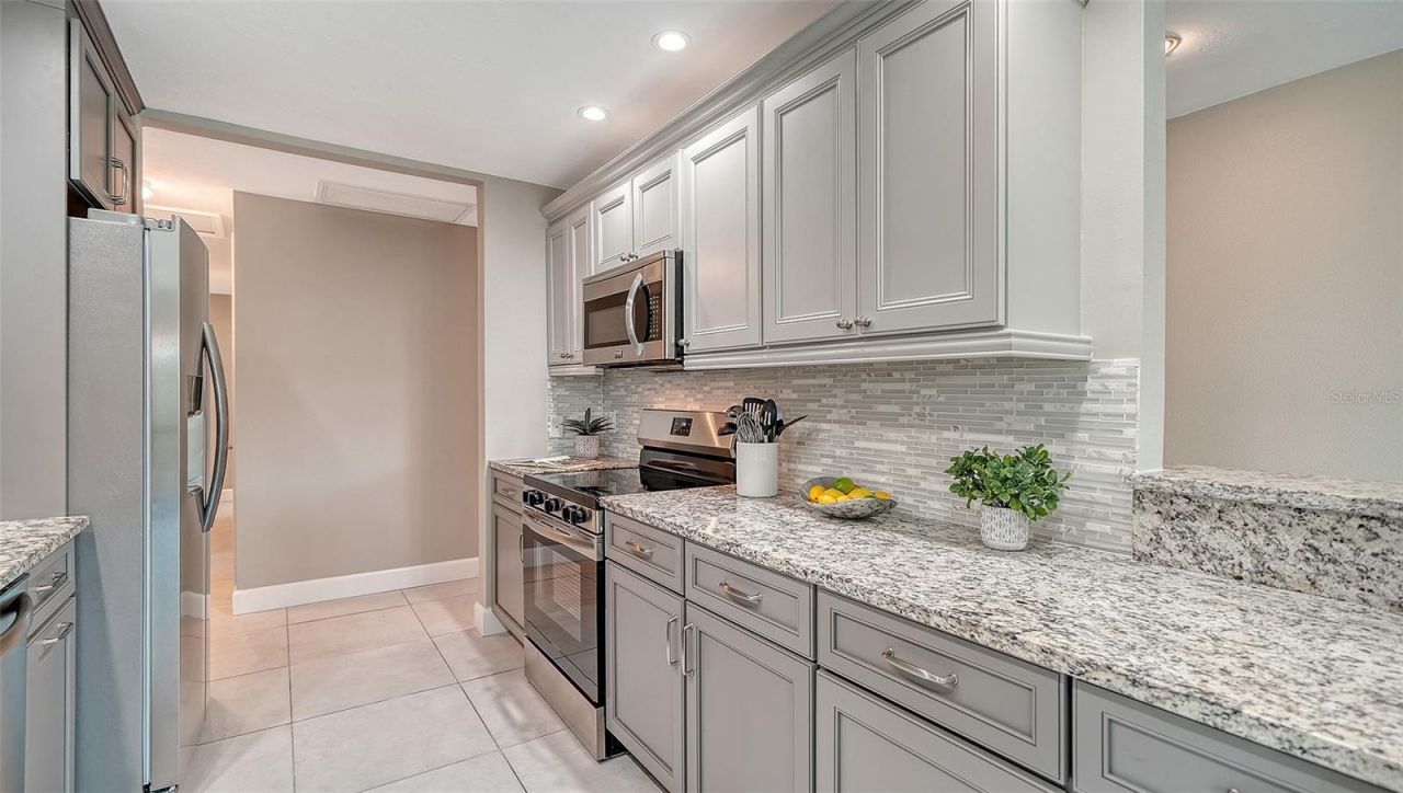 113 Whispering Sands Drive, Unit V47, Sarasota, FL 34242 Photo