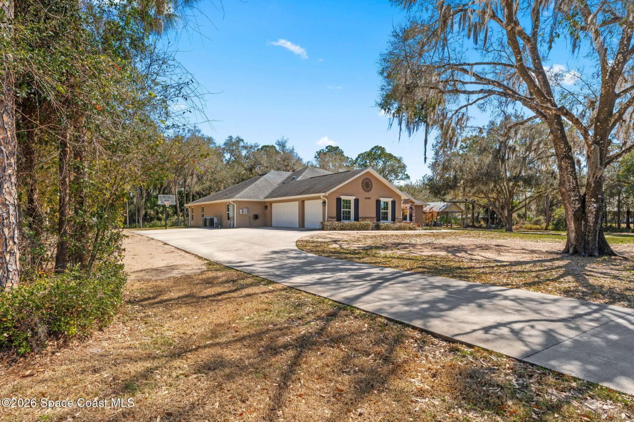 1695 Arch Road , Mims, FL 32754 Photo