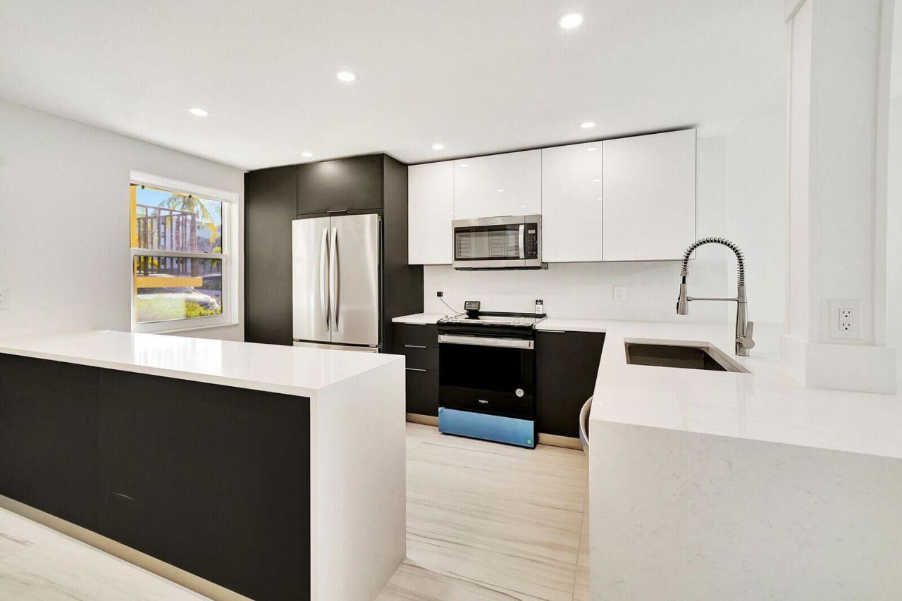 105 Paradise Harbour Boulevard, Unit 112, North Palm Beach, FL 33408 Photo