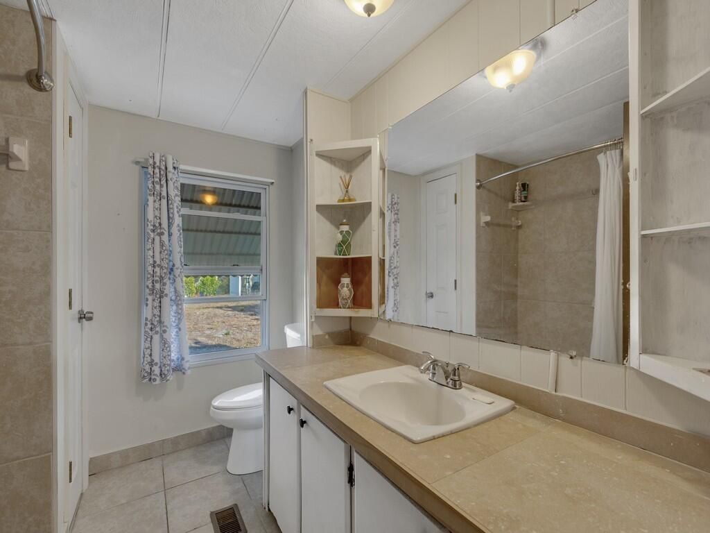 335 NE Tropicalia Lane, Jensen Beach, FL 34957 Photo