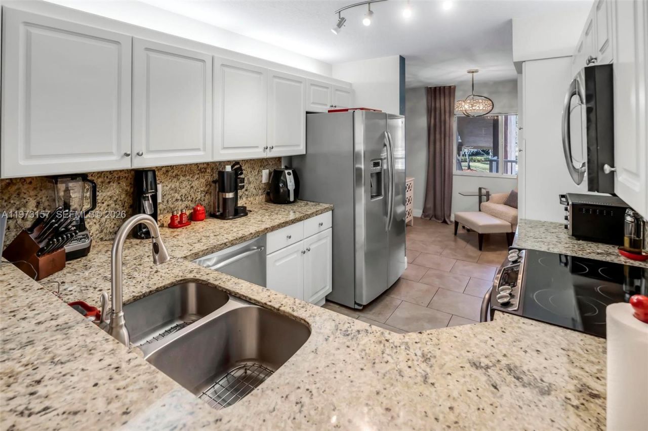 9539 Weldon Cir , Unit F214, Tamarac, FL 33321 Photo